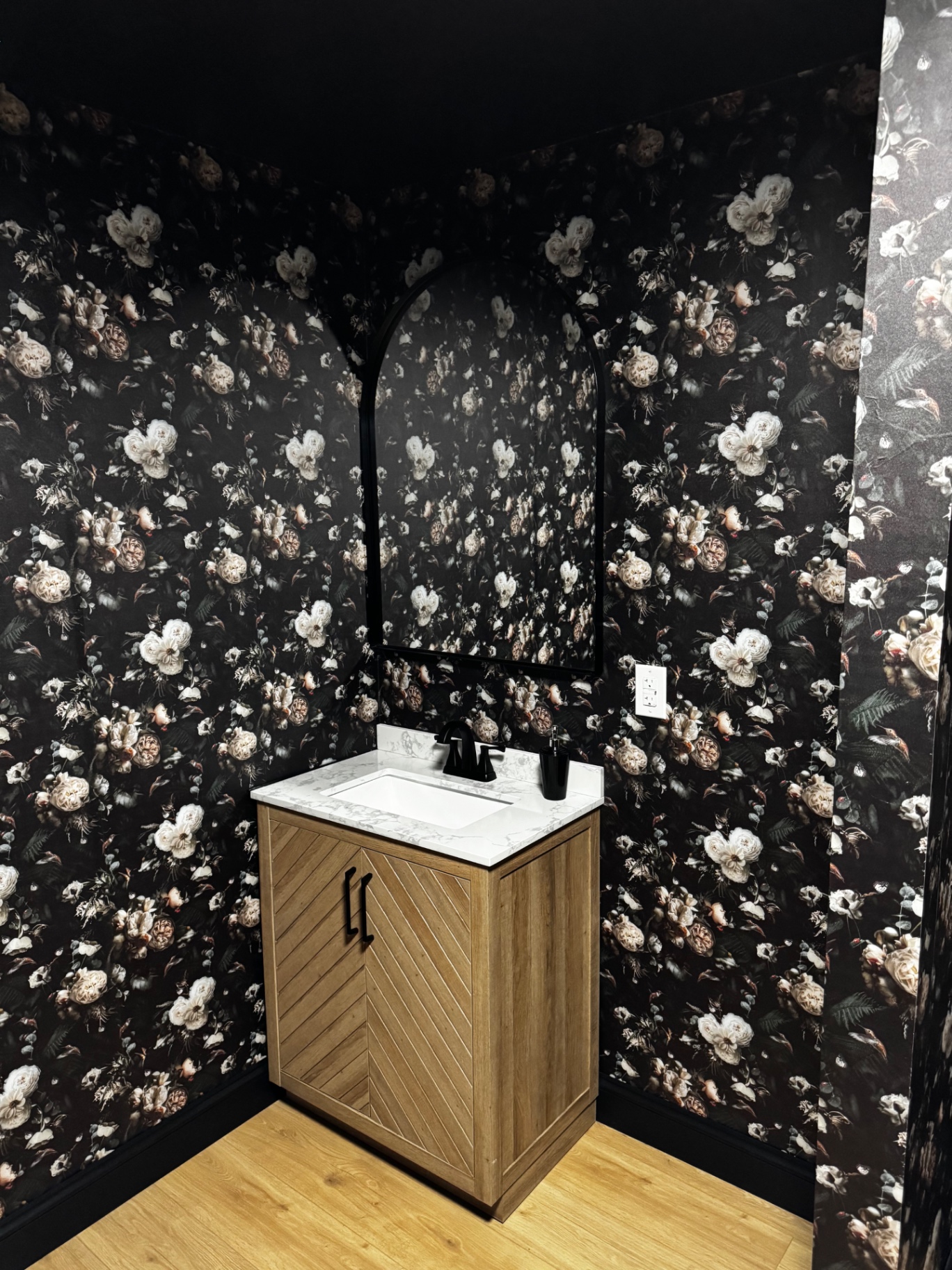 Dark floral powder room