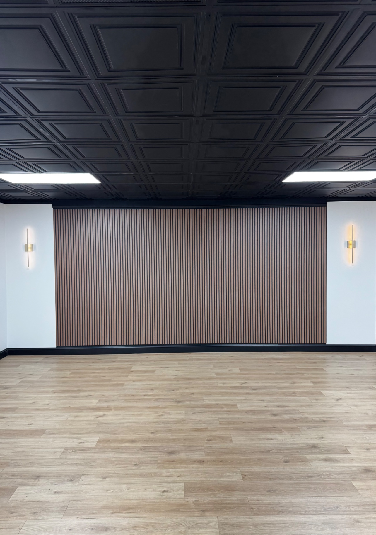 The Nova Loft main room with ghost chairs and round tables